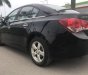 Chevrolet Cruze LT 2010 - Bán Chevrolet Cruze LT năm 2010, màu đen chính chủ, giá tốt