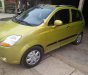 Chevrolet Spark LT 0.8 MT 2009 - Cần bán gấp Chevrolet Spark Lt năm sản xuất 2009, màu vàng