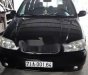 Kia Carnival 2006 - Bán ô tô Kia Carnival sản xuất năm 2006, màu đen xe gia đình, 215 triệu