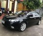 Kia Cerato 2009 - Cần bán gấp Kia Cerato năm 2009, màu đen