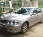 Toyota Camry 2002 - Bán Toyota Camry 2002, màu bạc số sàn