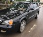 Daewoo Magnus 2004 - Cần bán gấp Daewoo Magnus đời 2004, màu đen giá cạnh tranh