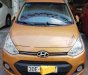 Hyundai Premio  1.2 AT 2016 - Bán xe Hyundai Grand i10 1.2 AT 2016, màu vàng, xe nhập