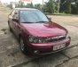 Ford Laser Delu 1.6 MT 2002 - Bán Ford Laser Delu 1.6 MT năm sản xuất 2002, màu đỏ