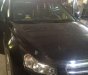 Daewoo Lacetti 2010 - Cần bán gấp Daewoo Lacetti đời 2010, màu đen