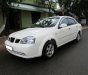 Daewoo Lacetti EX 1.6 MT 2004 - Cần bán lại xe Daewoo Lacetti EX 1.6 MT sản xuất 2004, màu trắng giá cạnh tranh