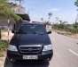 Kia Carnival GS 2.5 AT 2009 - Bán Kia Carnival GS 2.5 AT sản xuất năm 2009, màu đen  