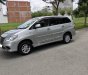 Toyota Innova 2.0E 2014 - Cần bán lại xe Toyota Innova 2.0E đời 2014, màu bạc số sàn