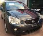 Kia Carens 2012 - Cần bán xe Kia Carens sản xuất năm 2012, màu đen, 410 triệu