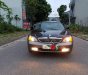 Daewoo Magnus 2.5 AT 2005 - Cần bán xe Daewoo Magnus 2.5 AT 2005, màu đen 