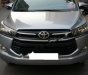 Toyota Innova 2.0E 2016 - Bán Toyota Innova 2.0E năm 2016, màu bạc số sàn 