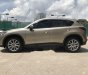 Mazda CX 5 2014 - Bán Mazda CX 5 đời 2014, màu vàng cát, giá chỉ 690 triệu