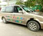 Kia Carnival 2009 - Bán Kia Carnival đời 2009, màu vàng cát