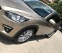 Mazda CX 5 2014 - Bán Mazda CX 5 đời 2014, màu vàng cát, giá chỉ 690 triệu