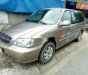 Kia Carnival 2009 - Bán Kia Carnival đời 2009, màu vàng cát