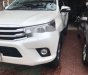 Toyota Hilux 2016 - Cần bán gấp Toyota Hilux đời 2016, màu trắng, xe nhập, giá 820tr