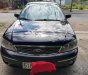 Ford Laser 2004 - Cần bán Ford Laser sản xuất 2004, màu đen, nhập khẩu nguyên chiếc, giá chỉ 242 triệu