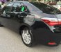 Toyota Corolla altis 2018 - Cần bán lại xe Toyota Corolla altis năm sản xuất 2018, màu đen  