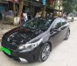 Kia Cerato 1.6AT  2016 - Cần bán xe Kia Cerato 1.6AT năm sản xuất 2016, màu đen, giá tốt