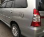 Toyota Innova E 2014 - Cần bán xe Toyota Innova E đời 2014, màu bạc xe gia đình, giá chỉ 560 triệu