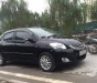 Toyota Vios 1.5 MT 2011 - Bán Toyota Vios 1.5 MT 2011, màu đen chính chủ, 309 triệu