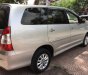 Toyota Innova 2.0E 2014 - Cần bán gấp Toyota Innova 2.0E năm sản xuất 2014, màu bạc chính chủ