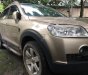 Chevrolet Captiva LT 2.4 MT 2007 - Cần bán lại xe Chevrolet Captiva LT 2.4 MT đời 2007, màu ghi vàng 