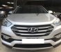 Hyundai Santa Fe  2.4AT 2017 - Cần bán Hyundai Santa Fe 2.4AT đời 2017, màu bạc, giá tốt