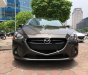 Mazda 2 1.5AT 2015 - Cần bán gấp Mazda 2 1.5AT đời 2015, màu nâu, 505tr