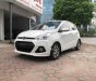 Hyundai Grand i10 1.0MT 2016 - Cần bán lại xe Hyundai Grand i10 1.0MT sản xuất năm 2016, màu trắng, nhập khẩu nguyên chiếc số sàn, giá tốt