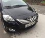 Toyota Vios 1.5 MT 2011 - Bán Toyota Vios 1.5 MT 2011, màu đen chính chủ, 309 triệu