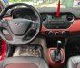 Hyundai Grand i10 1.2AT 2015 - Cần bán gấp Hyundai Grand i10 1.2AT năm sản xuất 2015, màu đỏ, nhập khẩu