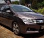 Honda City 1.5 AT 2017 - Bán Honda City 1.5 AT sản xuất 2017, màu nâu, 560 triệu