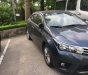 Toyota Corolla altis 1.8 2014 - Bán xe Toyota Corolla altis 1.8 đời 2014, màu xanh lam số tự động giá cạnh tranh