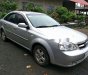 Daewoo Lacetti 1.6 EX 2009 - Bán ô tô Daewoo Lacetti 1.6 EX đời 2009, màu bạc chính chủ, giá chỉ 240 triệu