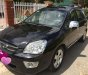 Kia Carens 2.0 MT 2009 - Cần bán xe Kia Carens 2.0 MT sản xuất năm 2009, màu đen xe gia đình 