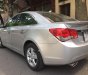 Chevrolet Cruze 2011 - Cần bán gấp Chevrolet Cruze 2011, màu bạc như mới