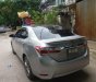 Toyota Corolla altis  1.8  2016 - Cần bán gấp Toyota Corolla altis 1.8 sản xuất 2016, màu bạc, giá chỉ 700 triệu