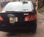 Toyota Corolla 2003 - Bán Toyota Corolla năm sản xuất 2003, màu đen, giá tốt