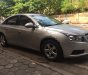 Chevrolet Cruze 2011 - Cần bán gấp Chevrolet Cruze 2011, màu bạc như mới