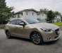 Mazda 2 2016 - Cần bán Mazda 2 2016, màu vàng cát