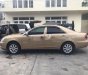 Toyota Camry 2002 - Cần bán xe Toyota Camry đời 2002, màu vàng cát