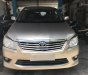 Toyota Innova E 2012 - Cần bán lại chiếc Toyota Innova E sản xuất 08/2012, màu nâu vàng