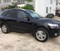 Hyundai Santa Fe VGT 2009 - Cần bán lại xe Hyundai Santa Fe VGT đời 2009, màu đen, xe nhập, 630 triệu