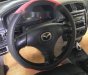 Mazda 323 2004 - Bán Mazda 323 đời 2004, màu đen, giá 180tr