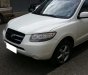 Hyundai Santa Fe 2.0AT 2009 - Cần bán xe Hyundai Santa Fe 2.0AT sản xuất 2009, màu trắng, nhập khẩu nguyên chiếc