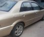 Ford Laser 2002 - Bán Ford Laser 2002, màu vàng