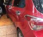 Hyundai Grand i10   2015 - Cần bán lại xe Hyundai Grand i10 năm 2015, màu đỏ còn mới, 335 triệu