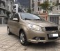 Chevrolet Aveo LT 1.5 MT 2014 - Cần bán gấp Chevrolet Aveo 1.5MT sản xuất 2014, màu vàng xe gia đình