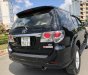 Toyota Fortuner G 2014 - Bán Forturner G ĐK 2015 số sàn, màu đen, máy dầu, turbo 100km/7 lít, xe vào đủ